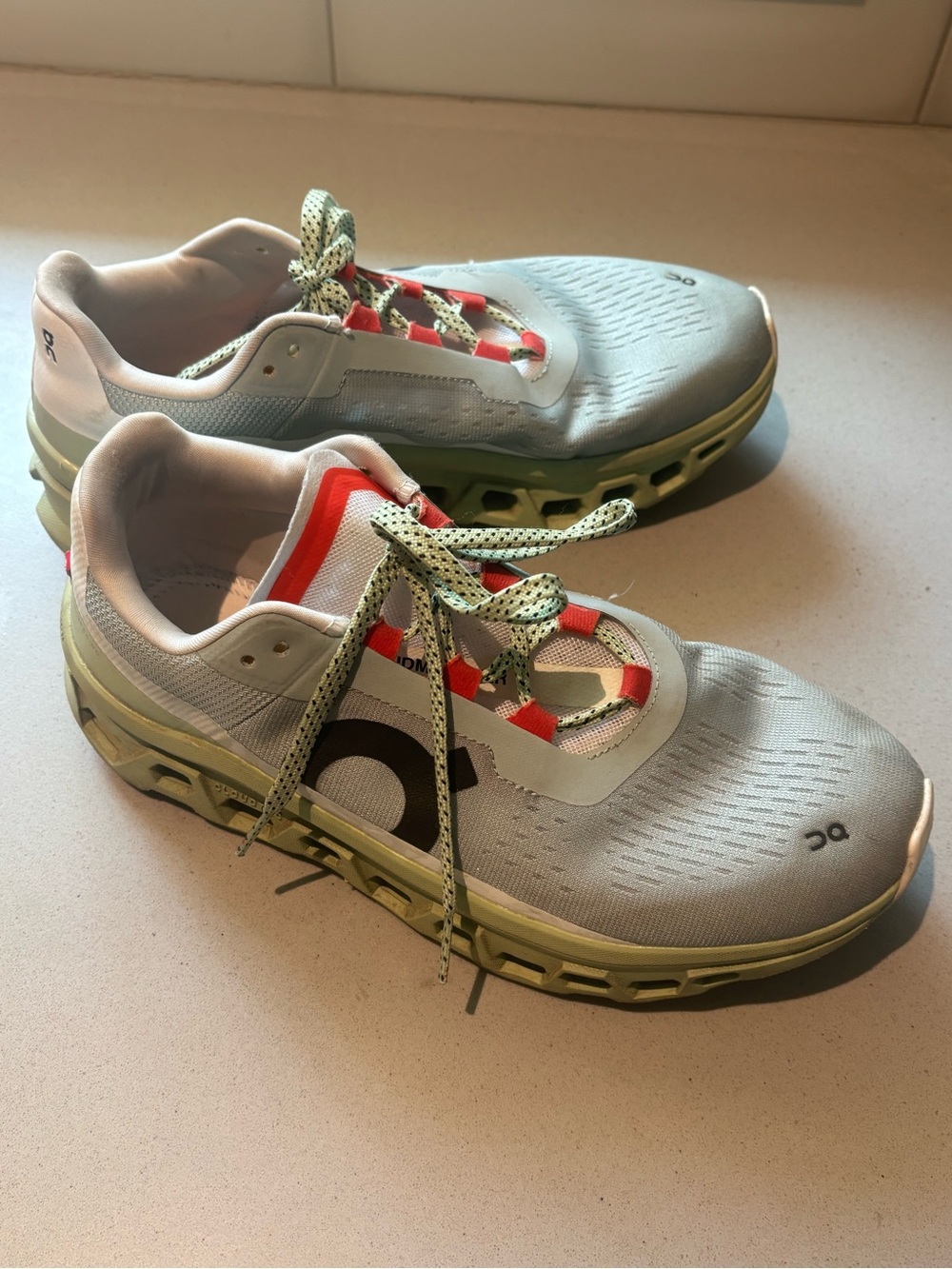 On Running Men’s Sneakers in Light Gray with Lime and Coral Accents